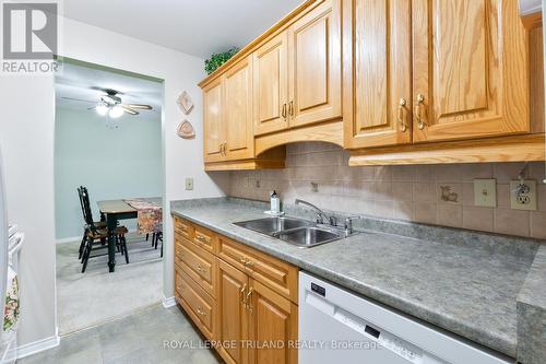 123 - 440 Wellington Street, St. Thomas, ON - Indoor Photo Showing Kitchen With Double Sink