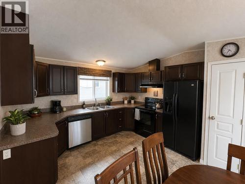 5514 Pine Crescent, Fort Nelson, BC - Indoor Photo Showing Kitchen With Double Sink