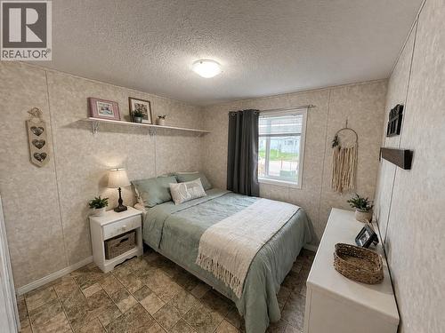 5514 Pine Crescent, Fort Nelson, BC - Indoor Photo Showing Bedroom