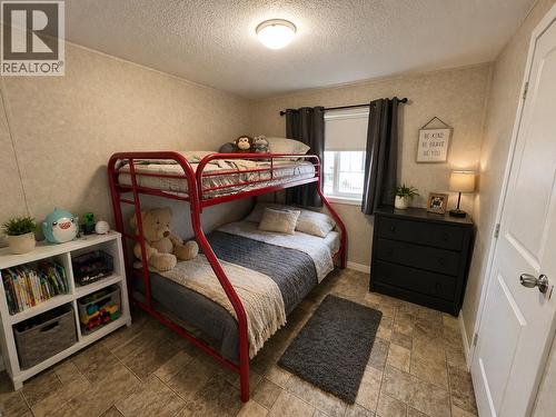 5514 Pine Crescent, Fort Nelson, BC - Indoor Photo Showing Bedroom