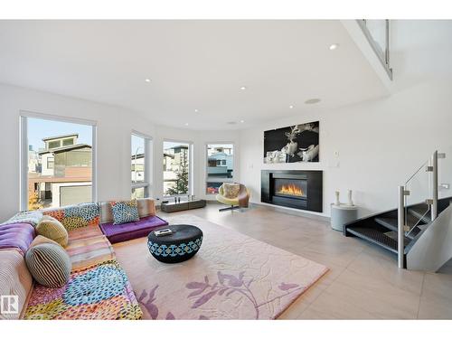 10065 90 Av Nw, Edmonton, AB - Indoor Photo Showing Living Room With Fireplace
