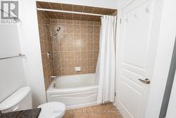 Bathroom with Granite Counter and In-Unit Laundry - 