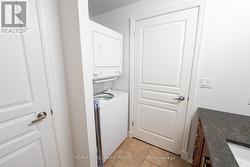 Bathroom with Granite Counter and In-Unit Laundry - 