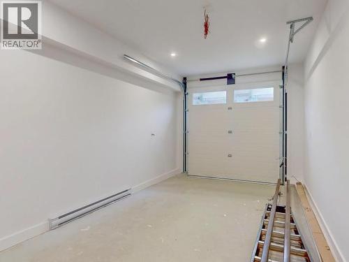 103-5191 Manson Ave, Powell River, BC - Indoor Photo Showing Garage
