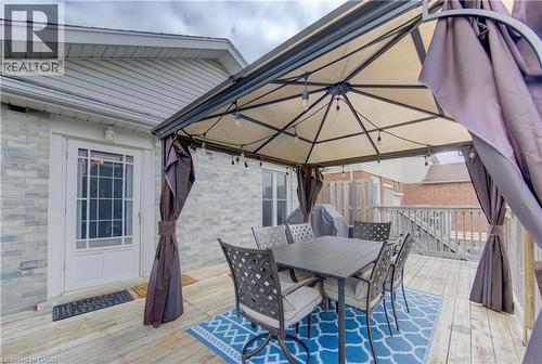 Expansive deck featuring a shaded gazebo, string lighting, and direct exterior access - 512 Hidden Creek Drive, Kitchener, ON - Outdoor With Deck Patio Veranda With Exterior