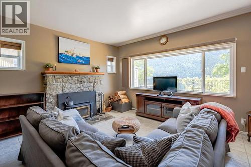 2465 3A Highway, Nelson, BC - Indoor Photo Showing Living Room With Fireplace