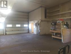 Bay 2: 14 ft x 14 ft door. - 