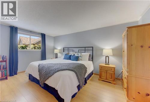 Primary Bedroom, with walk-in closet and direct access to bathroom - 7 Kilkerran Crescent, Kitchener, ON - Indoor Photo Showing Bedroom
