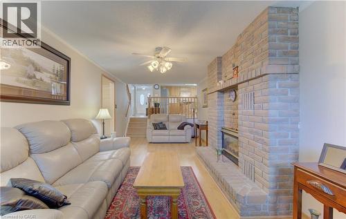 So much space for the whole family! - 7 Kilkerran Crescent, Kitchener, ON - Indoor Photo Showing Living Room With Fireplace