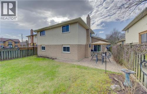 Big yard has gates on both sides of the house. - 7 Kilkerran Crescent, Kitchener, ON - Outdoor With Deck Patio Veranda With Exterior