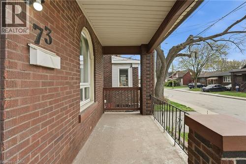 Expansive front porch for enjoying outdoors - 73 Gertrude Street, Hamilton, ON - Outdoor With Exterior