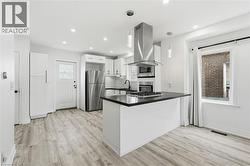 Large open concept kitchen and living area - 