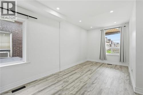 Living and dining area - 73 Gertrude Street, Hamilton, ON - Indoor Photo Showing Other Room