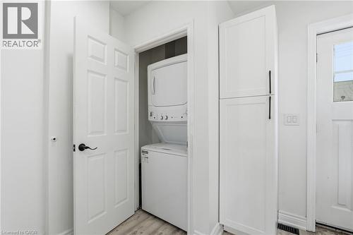 Convenient in-suite laundry on the main level. - 73 Gertrude Street, Hamilton, ON - Indoor Photo Showing Laundry Room