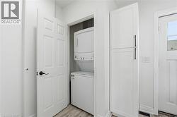 Convenient in-suite laundry on the main level. - 