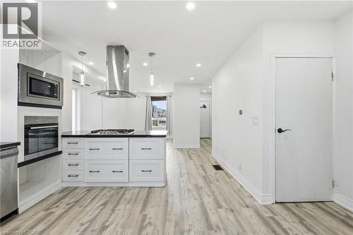 Bright beautiful kitchen with built-in appliances. - 73 Gertrude Street, Hamilton, ON - Indoor Photo Showing Other Room