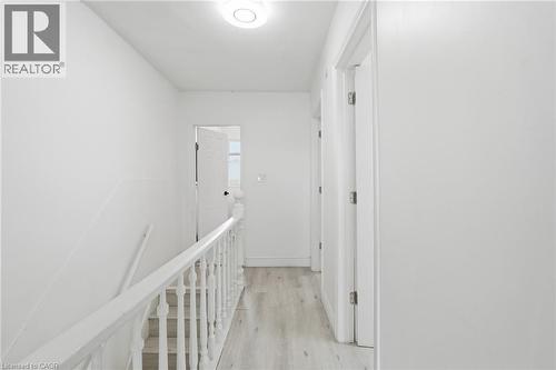 Brightly lit upper hallway. - 73 Gertrude Street, Hamilton, ON - Indoor Photo Showing Other Room