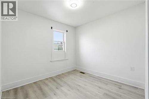 Window in second bedroom - 73 Gertrude Street, Hamilton, ON - Indoor Photo Showing Other Room