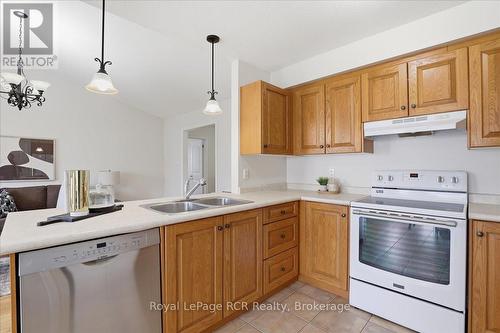 14 Parkside Street, Mapleton, ON - Indoor Photo Showing Kitchen With Double Sink