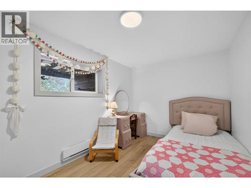 1 of 3 beds downstairs - 374 Kildare Way, Vernon, BC - Indoor Photo Showing Bedroom