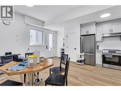 Legal Suite Living/ Dining/ Kitchen and Entrance - 