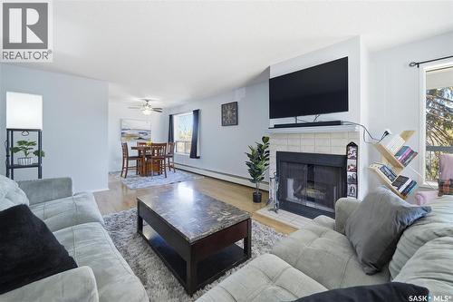 223 217B Cree Place, Saskatoon, SK - Indoor Photo Showing Living Room With Fireplace