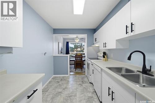 223 217B Cree Place, Saskatoon, SK - Indoor Photo Showing Kitchen With Double Sink