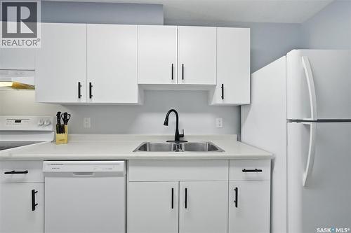 223 217B Cree Place, Saskatoon, SK - Indoor Photo Showing Kitchen With Double Sink