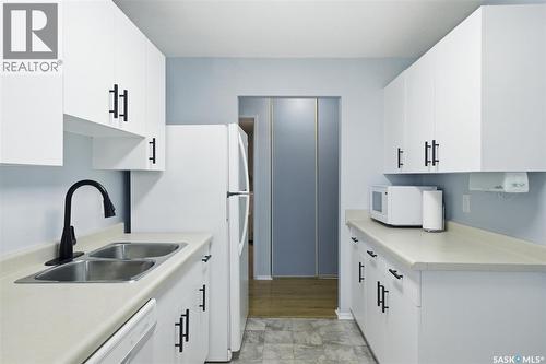 223 217B Cree Place, Saskatoon, SK - Indoor Photo Showing Kitchen With Double Sink