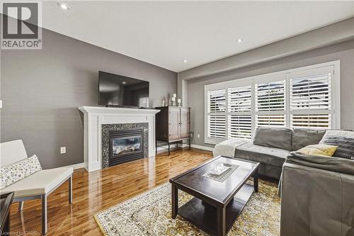 419 Dicenzo Drive, Hamilton, ON - Indoor Photo Showing Living Room With Fireplace