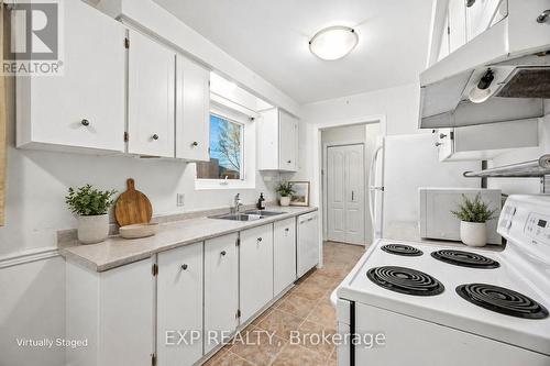 107 Archdekin Drive, Brampton, ON - Indoor Photo Showing Kitchen With Double Sink