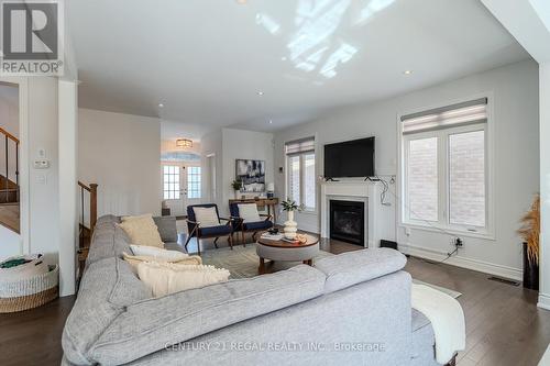 25 Elysian Fields Circle, Brampton, ON - Indoor Photo Showing Living Room With Fireplace