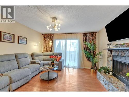 202 Balmoral Place, Port Moody, BC - Indoor Photo Showing Living Room With Fireplace