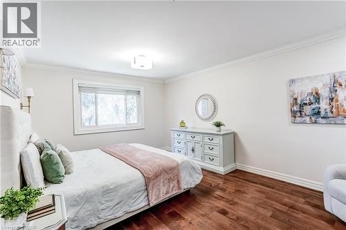 Hardwood flooring complementing light-toned walls - 1264 Kane Road, Mississauga, ON - Indoor Photo Showing Bedroom