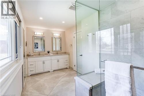 Dual vanity with white cabinetry and chrome hardware - 1264 Kane Road, Mississauga, ON - Indoor Photo Showing Bathroom