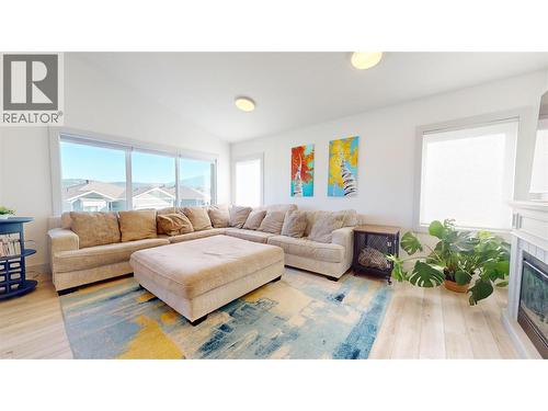 365 Legacy Lookout, Cranbrook, BC - Indoor Photo Showing Living Room With Fireplace