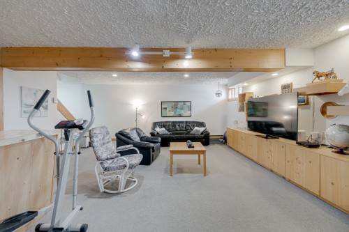 Salle familiale - 405 Av. Mathieu, Donnacona, QC - Indoor Photo Showing Gym Room
