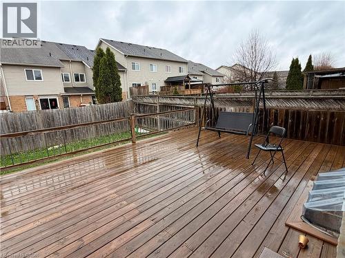 Expansive wood deck with a perimeter railing and privacy fencing - 1126 Copper Leaf Crescent, Kitchener, ON - Outdoor With Deck Patio Veranda With Exterior