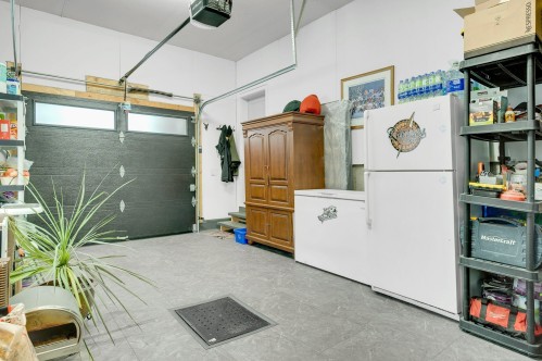 Garage - 154 Ch. Du Roi, Saint-Hippolyte, QC - Indoor Photo Showing Garage
