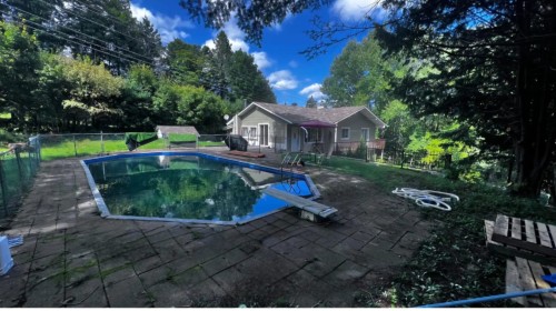 Pool - 562 Mtée Papineau N., Saint-Sauveur, QC - Outdoor With Backyard