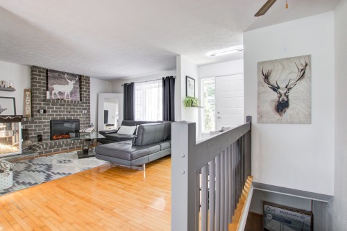 Salon - 38 Rue Carmen, Granby, QC - Indoor Photo Showing Living Room With Fireplace