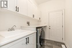 Main Floor Laundry / Entry to Garage - 