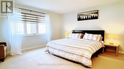 Large Primary Bedroom with Walking Closet - 325 Trudeau Drive E, Milton, ON - Indoor Photo Showing Bedroom