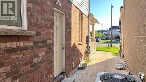 Side Entrance - 325 Trudeau Drive E, Milton, ON - Outdoor With Exterior