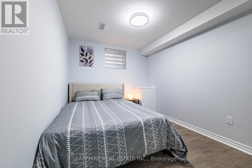 Basement Bedroom 1 with Large Window - 325 Trudeau Drive E, Milton, ON - Indoor Photo Showing Bedroom