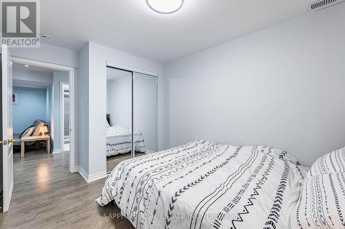 Basement Bedroom 2 with Large Window - 325 Trudeau Drive E, Milton, ON - Indoor Photo Showing Bedroom