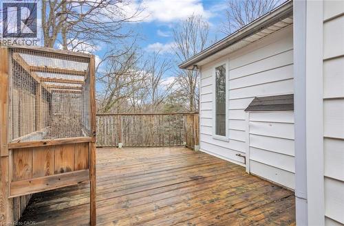 Expansive wood deck with a full wood railing and built-in wood structure - 22 Blackhorne Crescent, Kitchener, ON - Outdoor With Deck Patio Veranda With Exterior
