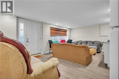 Living area with light wood-finish flooring and recessed lighting - 22 Blackhorne Crescent, Kitchener, ON - Indoor