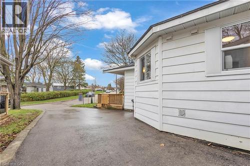 Asphalt driveway providing access to the property - 22 Blackhorne Crescent, Kitchener, ON - Outdoor