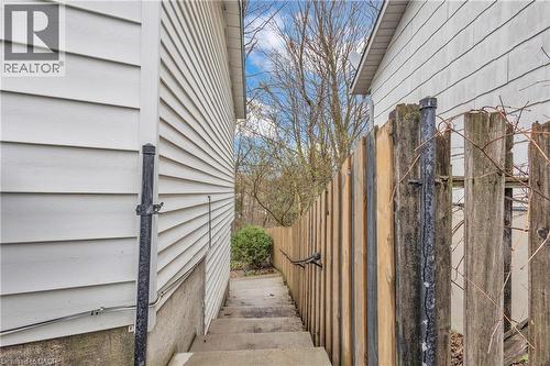 Concrete exterior steps descending between two structures - 22 Blackhorne Crescent, Kitchener, ON - Outdoor